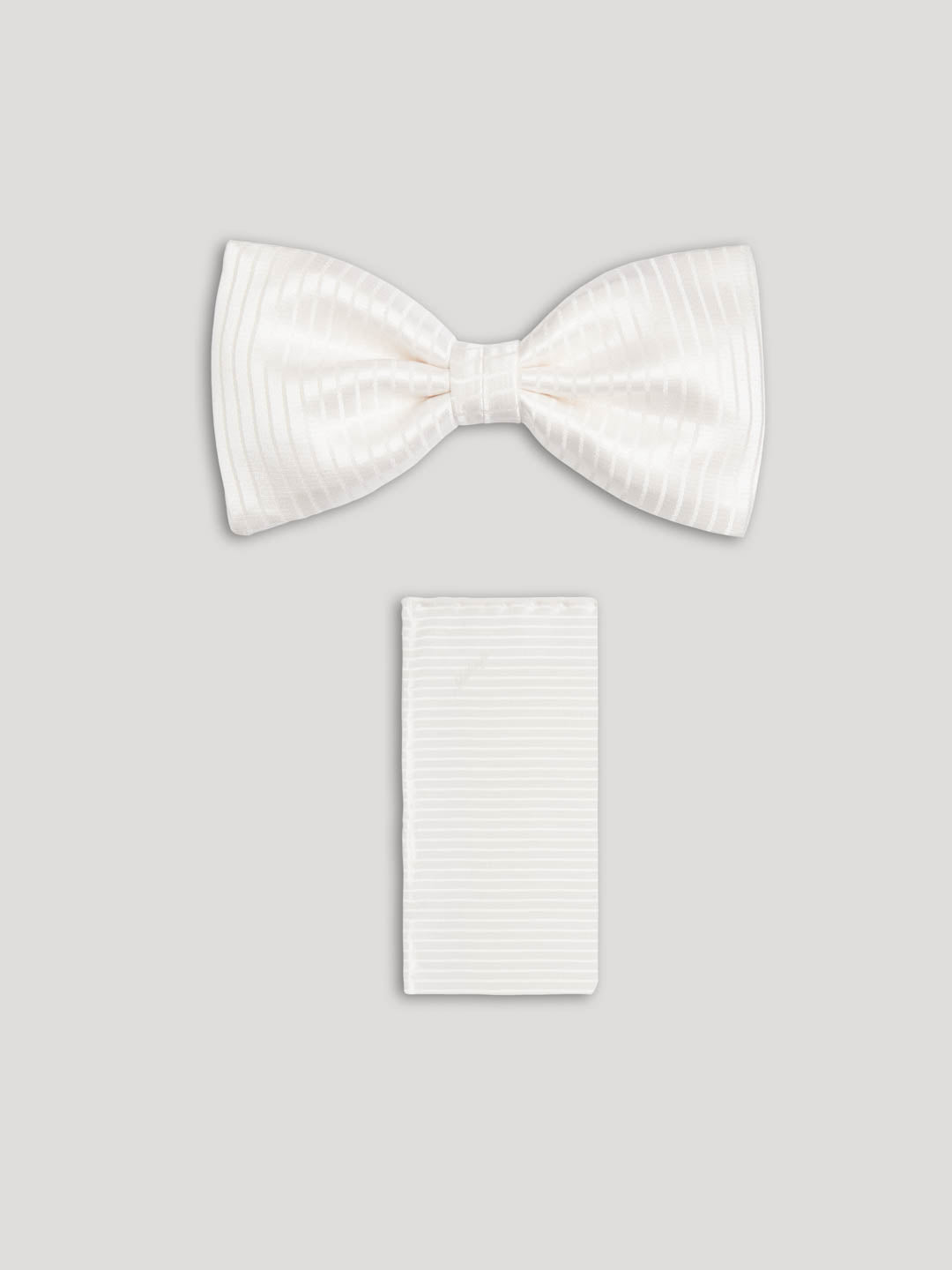 White silk bow tie with matching handkerchief.