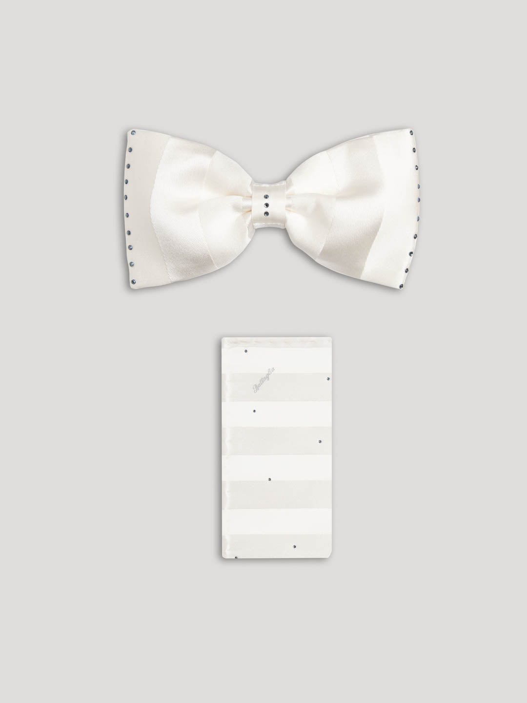 White silk bow tie with green swarovski details and matching handkerchief.