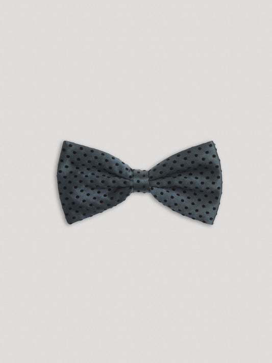 Green polkadot silk bow tie.