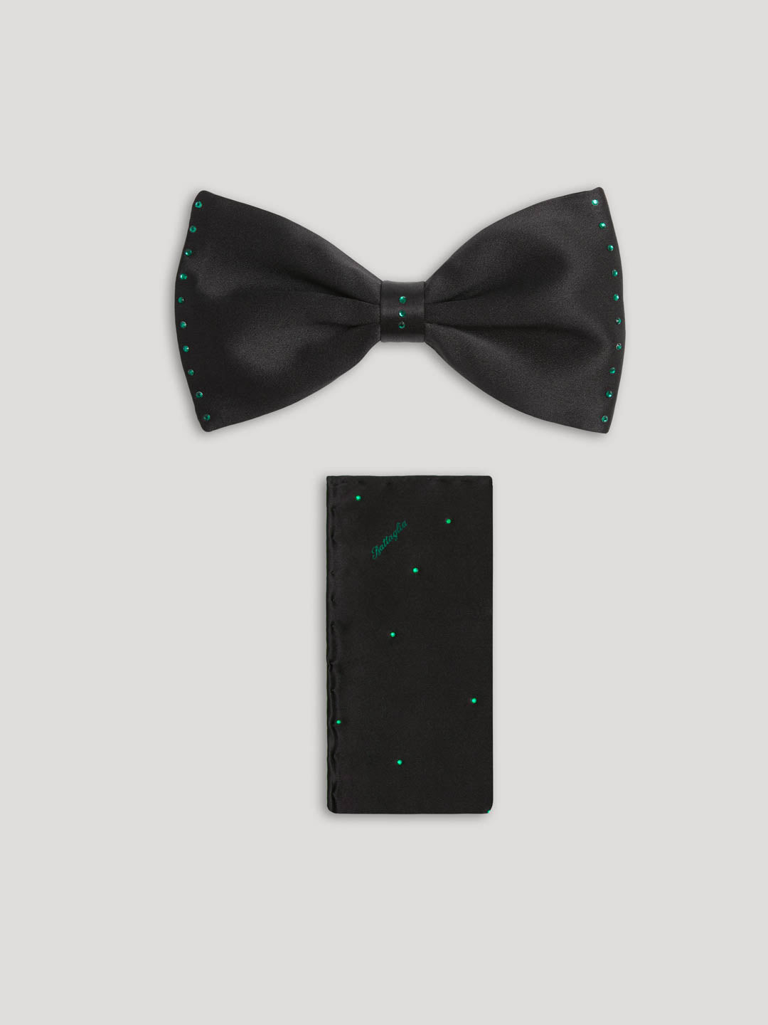 Black silk bow tie with matching handkerchief and green swarovski crystal details.