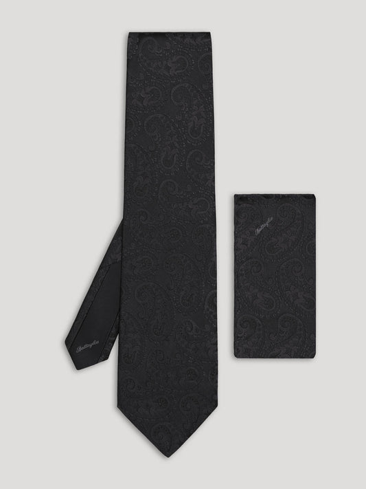 Black tone on tone paisley tie with matching handkerchief.