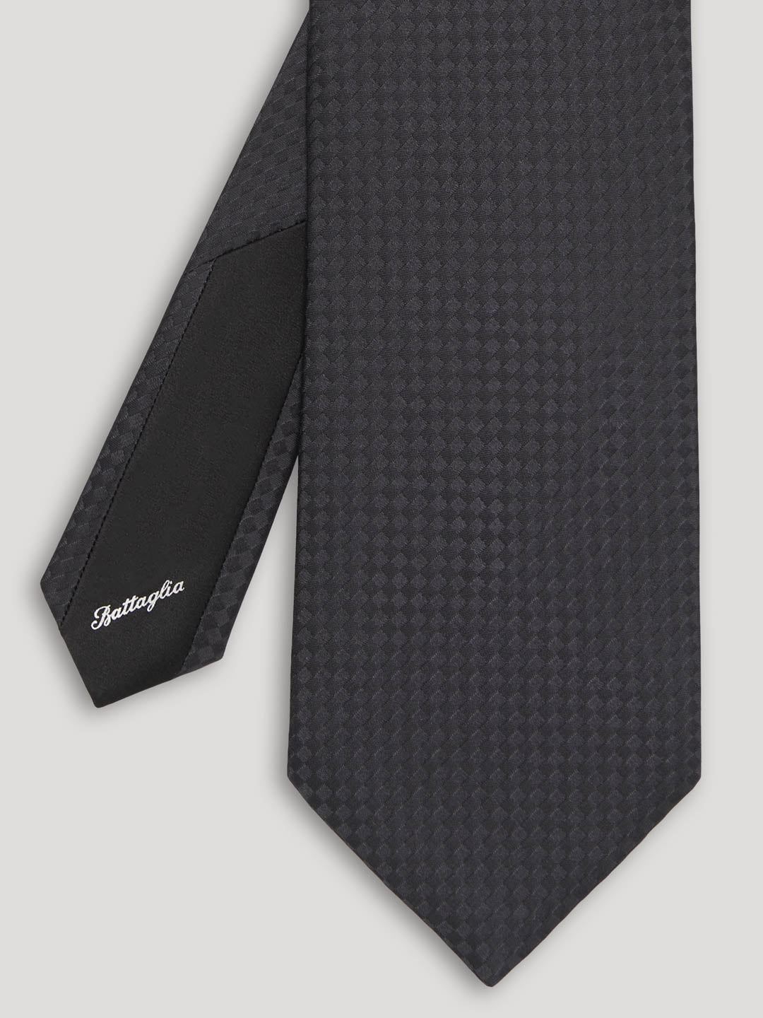 Black tone on tone with check pattern.