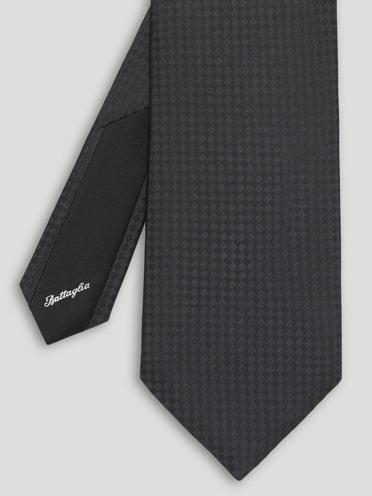 Black tone on tone with check pattern.