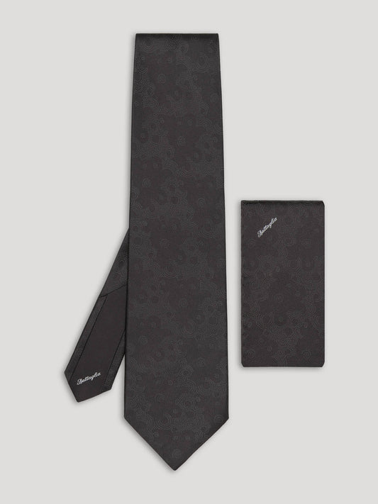 Black tone on tone silk tie with matching handkerchief.