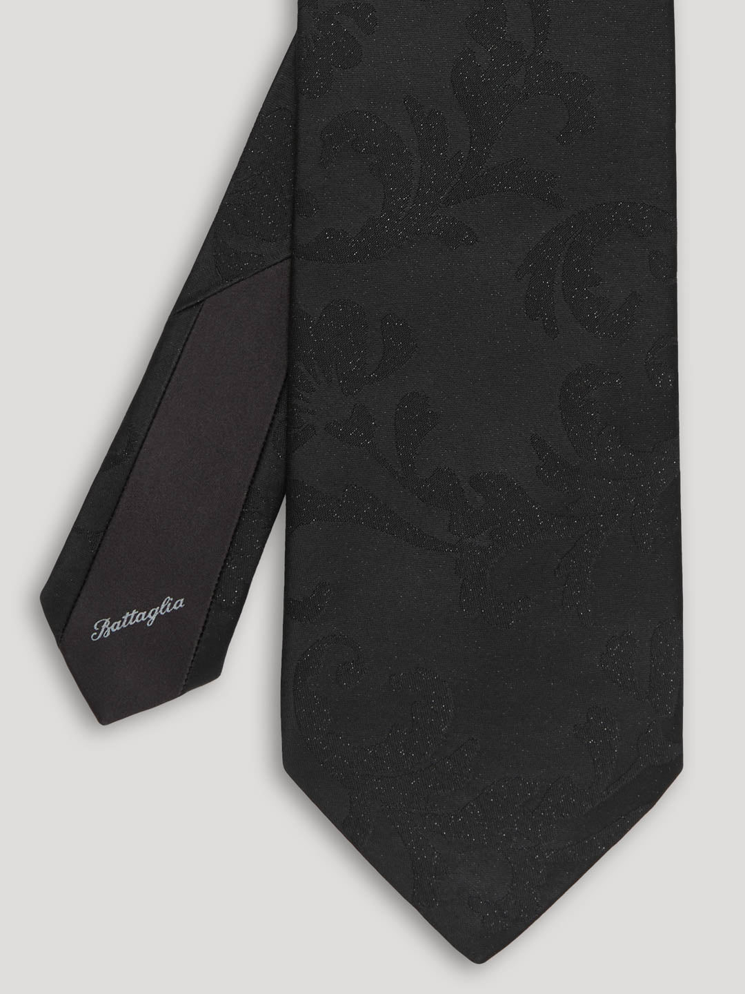 Black tone on tone silk tie.