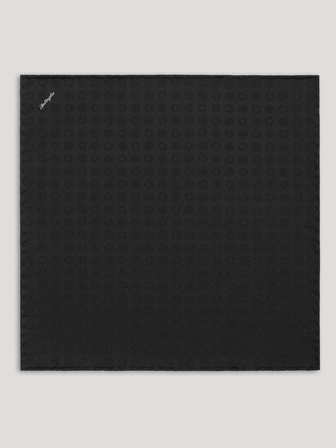 Black tone on tone polkadot handkerchief.