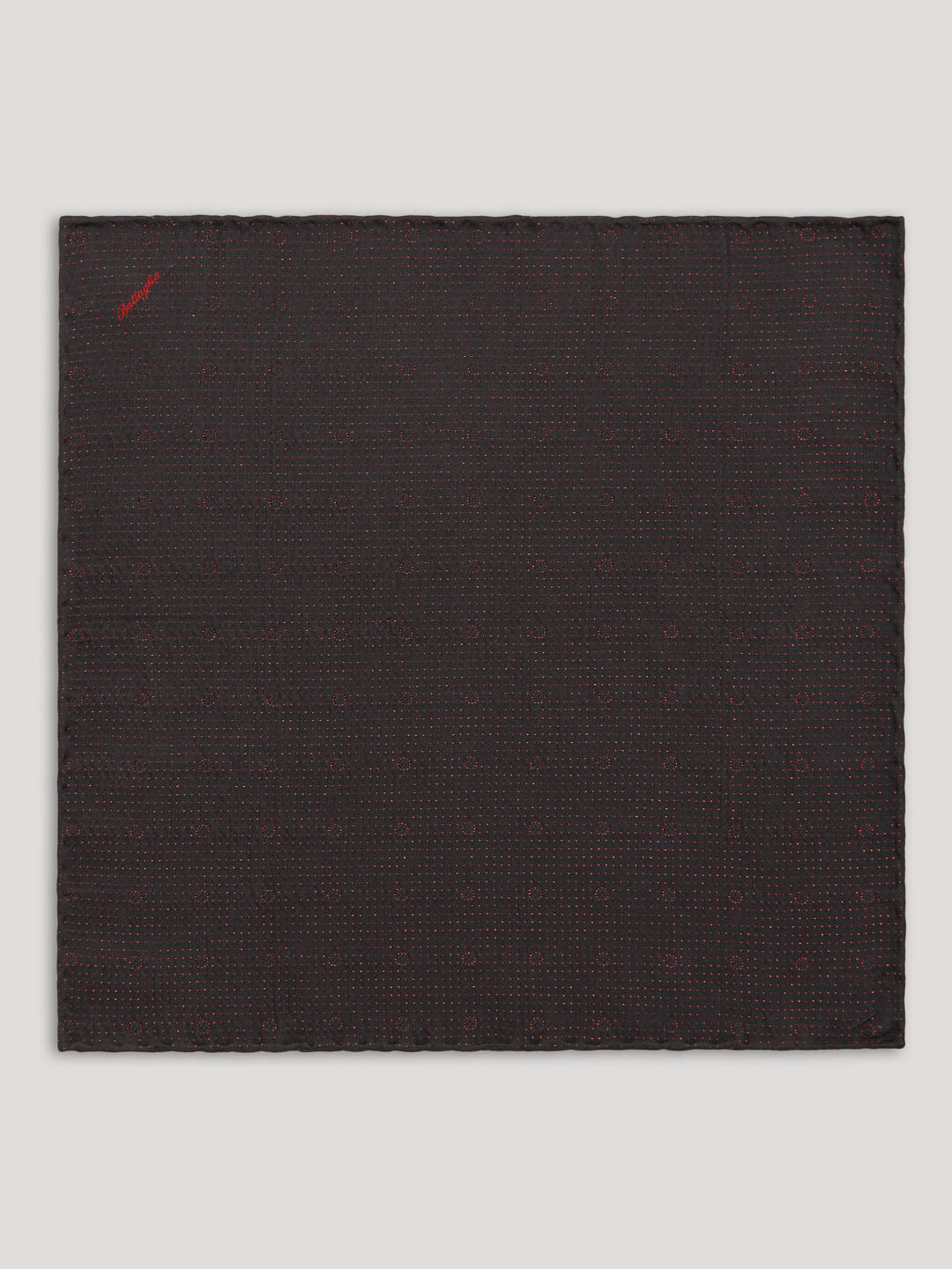 Black tie with red polkadots.