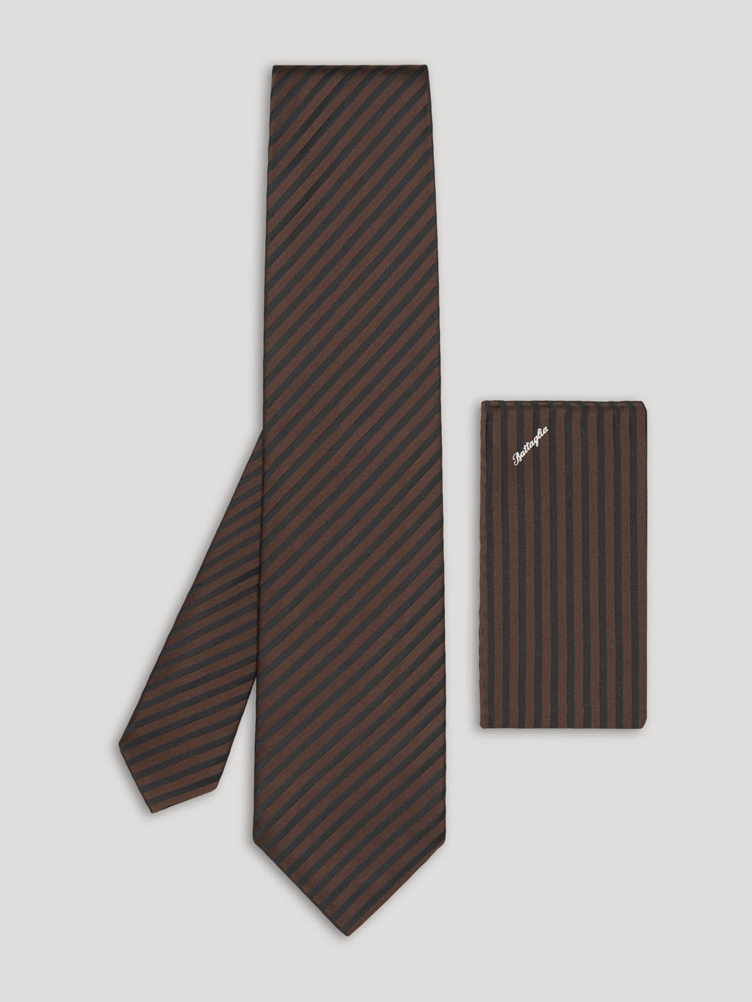 Brown and black stripe tie with handkerchief.