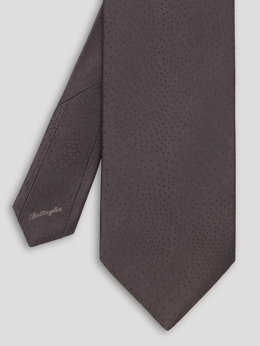 Black silk tie.