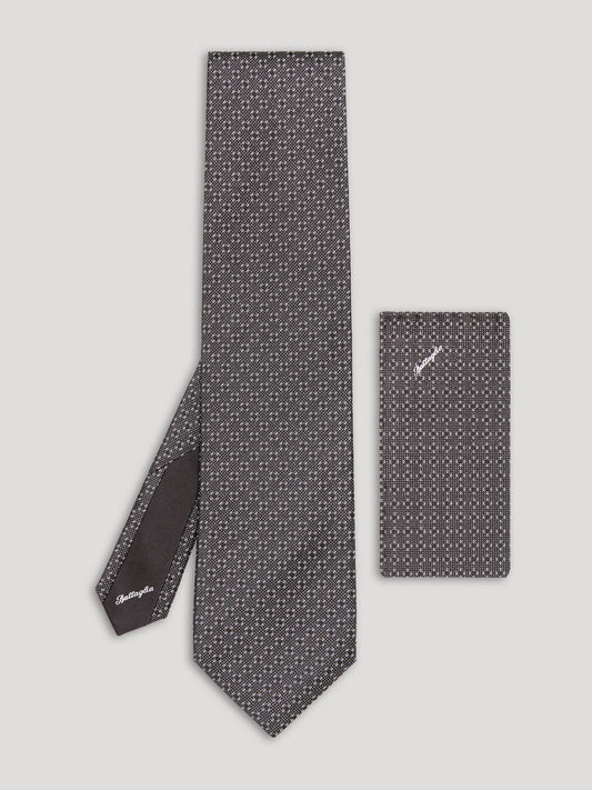 Grey and silver silk tie with handkerchief.