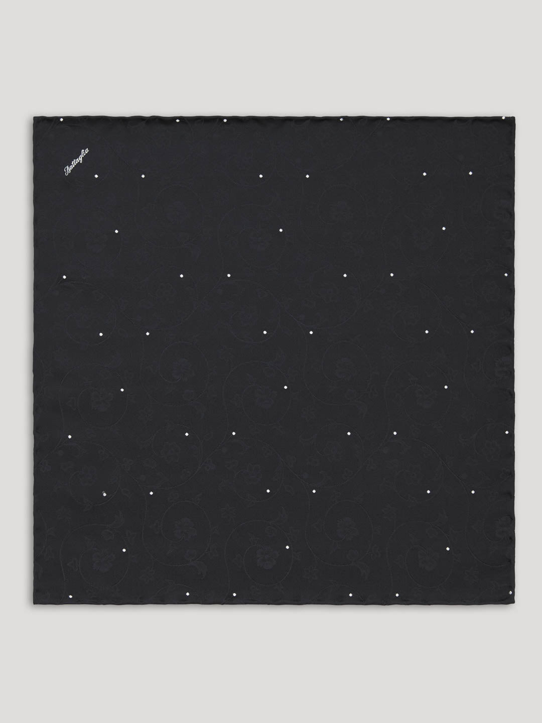 Black floral handkerchief with polkadots.