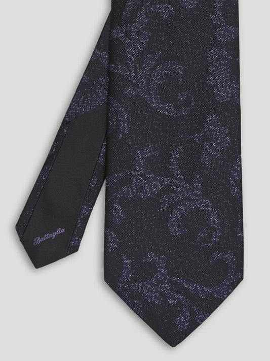 Black tie with floral design.