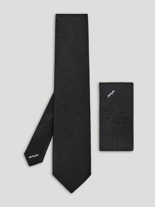 Black tie with black handkerchief.