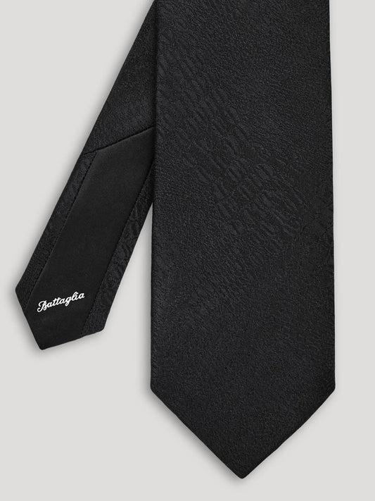 Black silk tie.