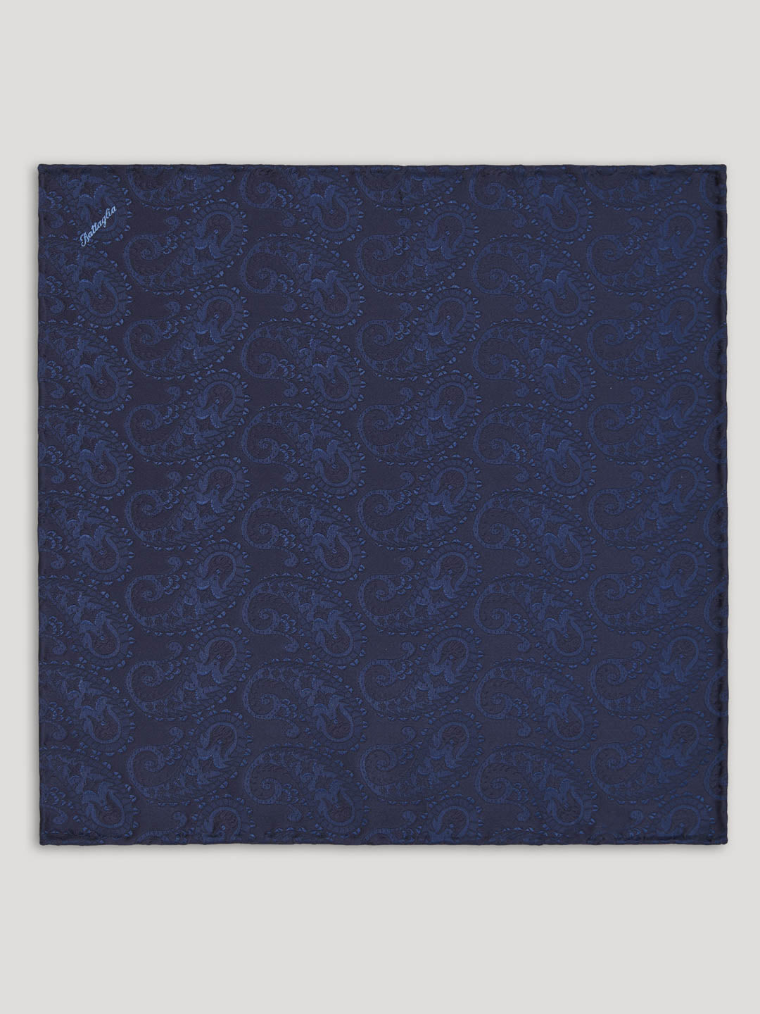 Blue paisley handkerchief.