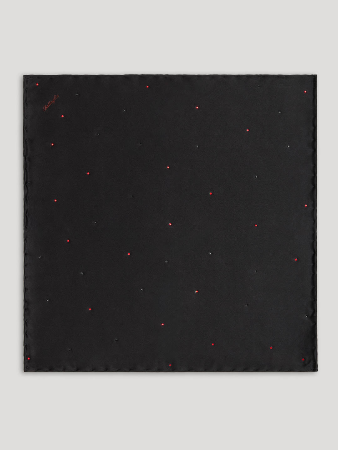 Black silk handkerchief with red polkadots.