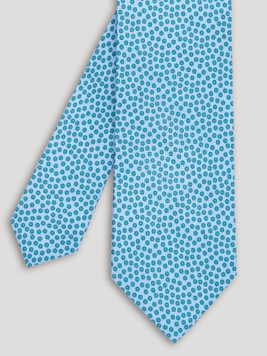 Light blue floral tie.