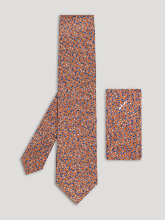 Brown floral tie with blue and yellow floral details and matching handkerchief.