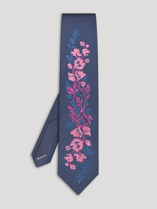 Navy tie with woven pink and blue floral design.