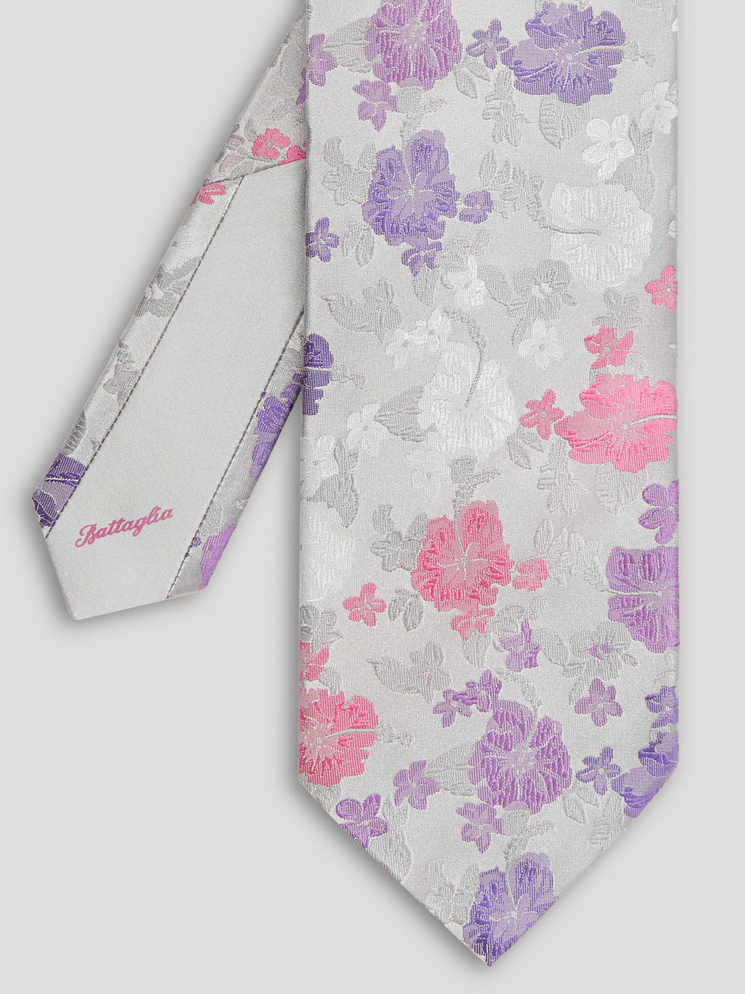 Silver tie with pink and purple flowers. 
