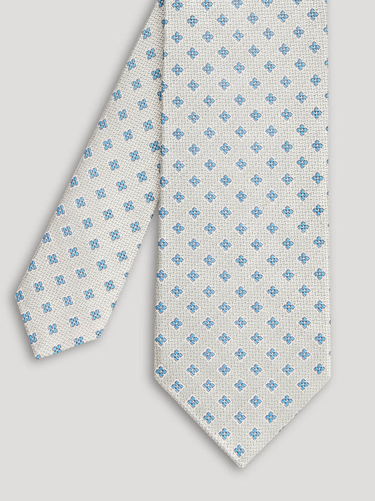 Silver tie with blue diamonds.