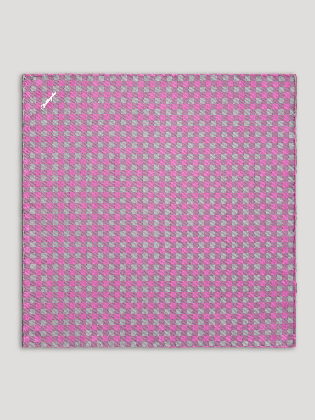Handkerchief with purple, pink, and grey diamond design.