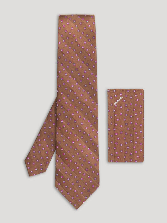 Brown stripe tie with small diamond design and matching handkerchief.