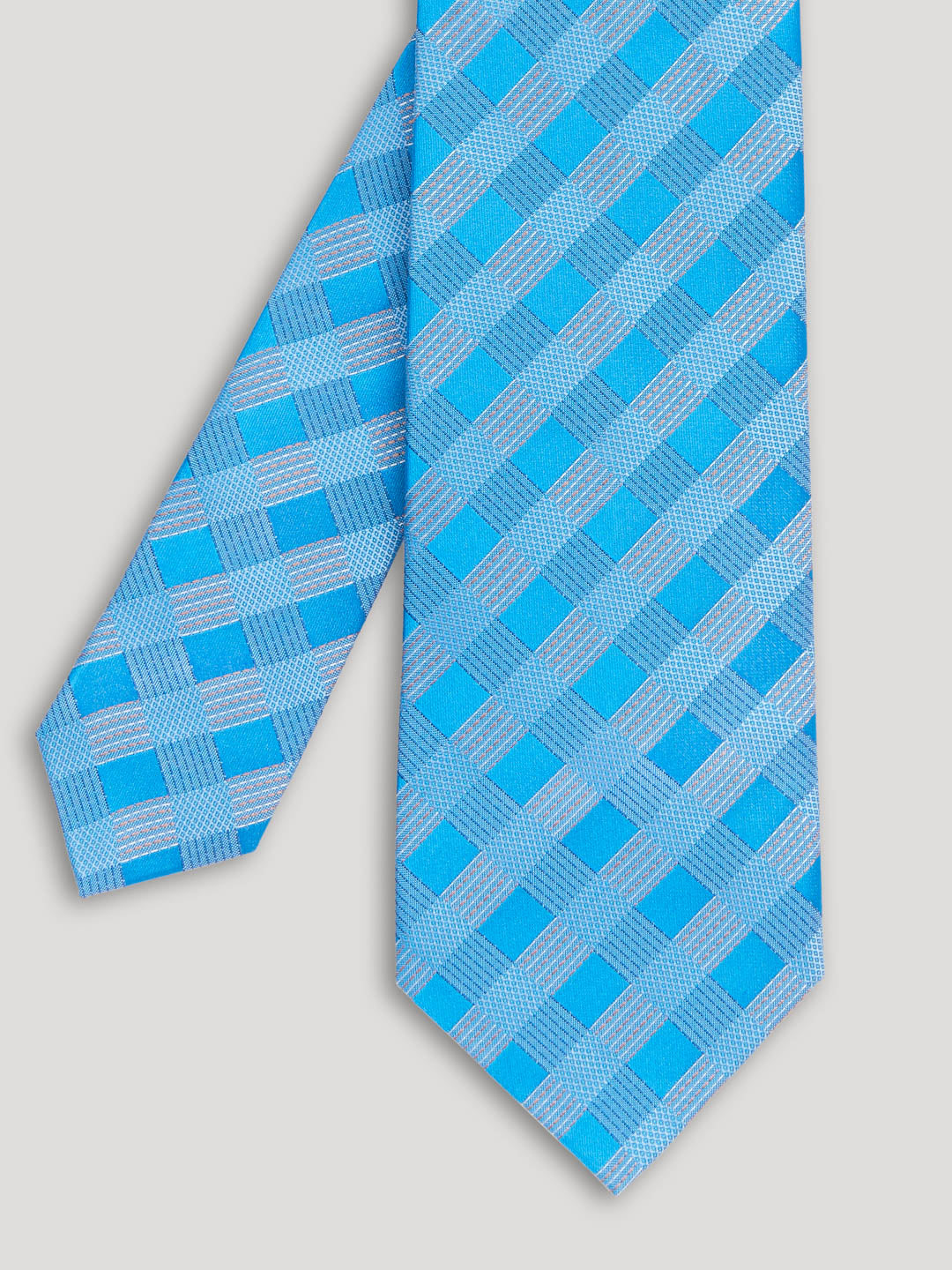 Blue geometric design tie.