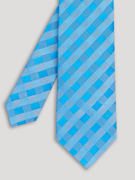 Blue geometric design tie.