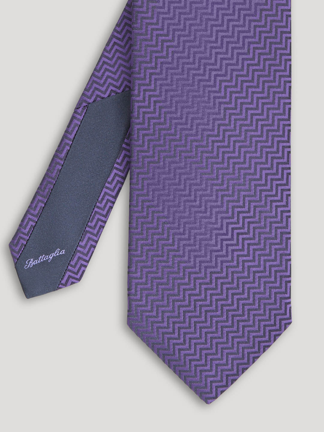 Purple zig zag design tie.