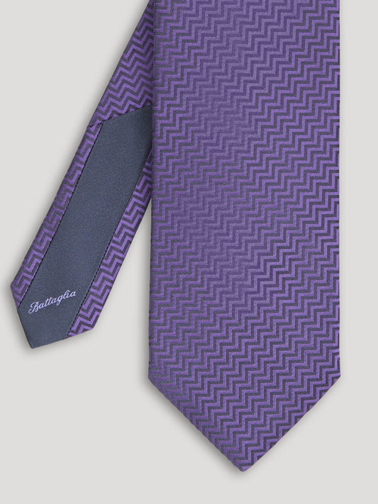 Purple zig zag design tie.