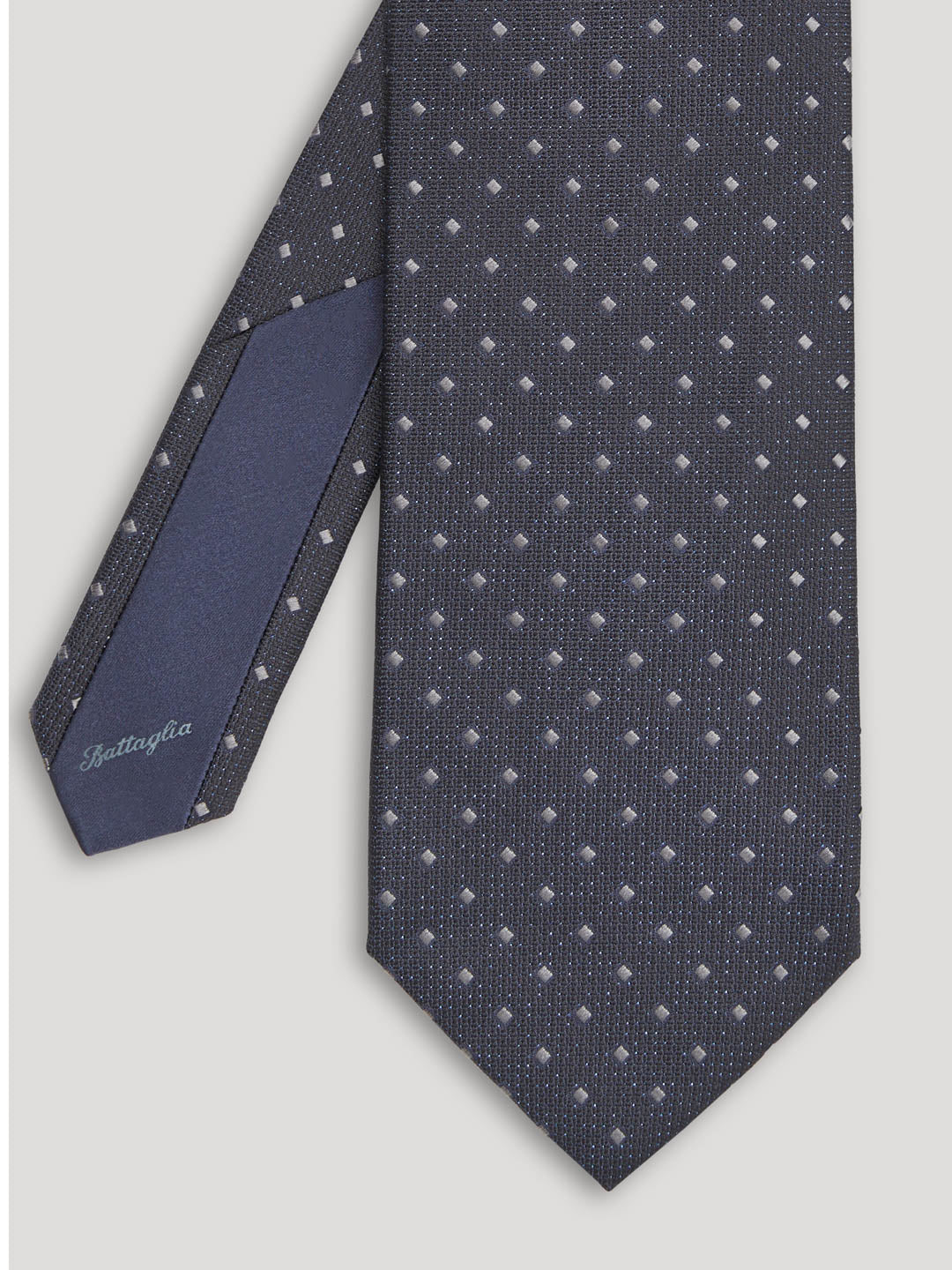 Black tie with small grey diamond design.