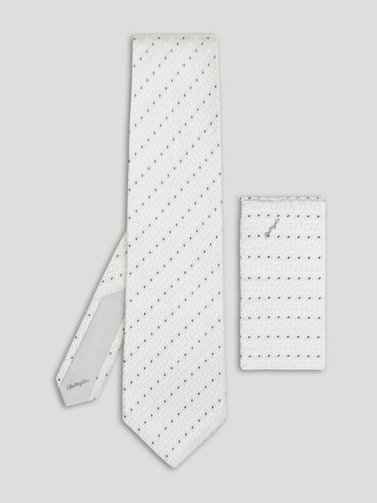 Silver tie with pinpoint geometric design and matching handkerchief. 