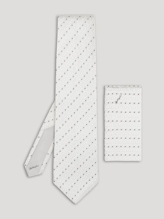 Silver tie with pinpoint geometric design and matching handkerchief.