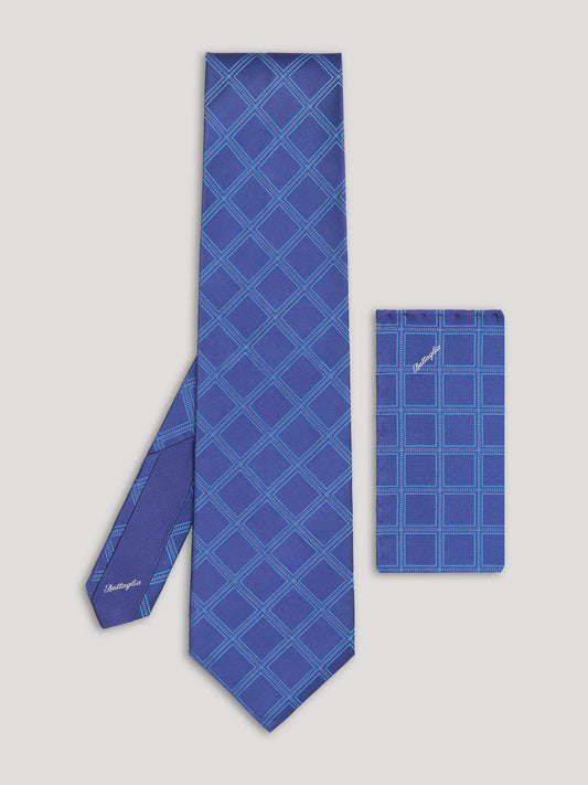 Blue diamond design tie with matching handkerchief.