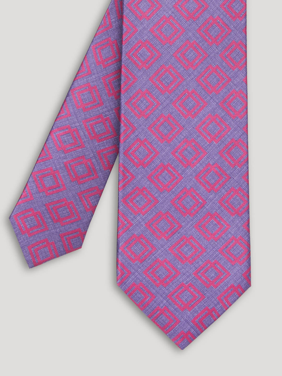 Pink and purple tie with geometric design. 