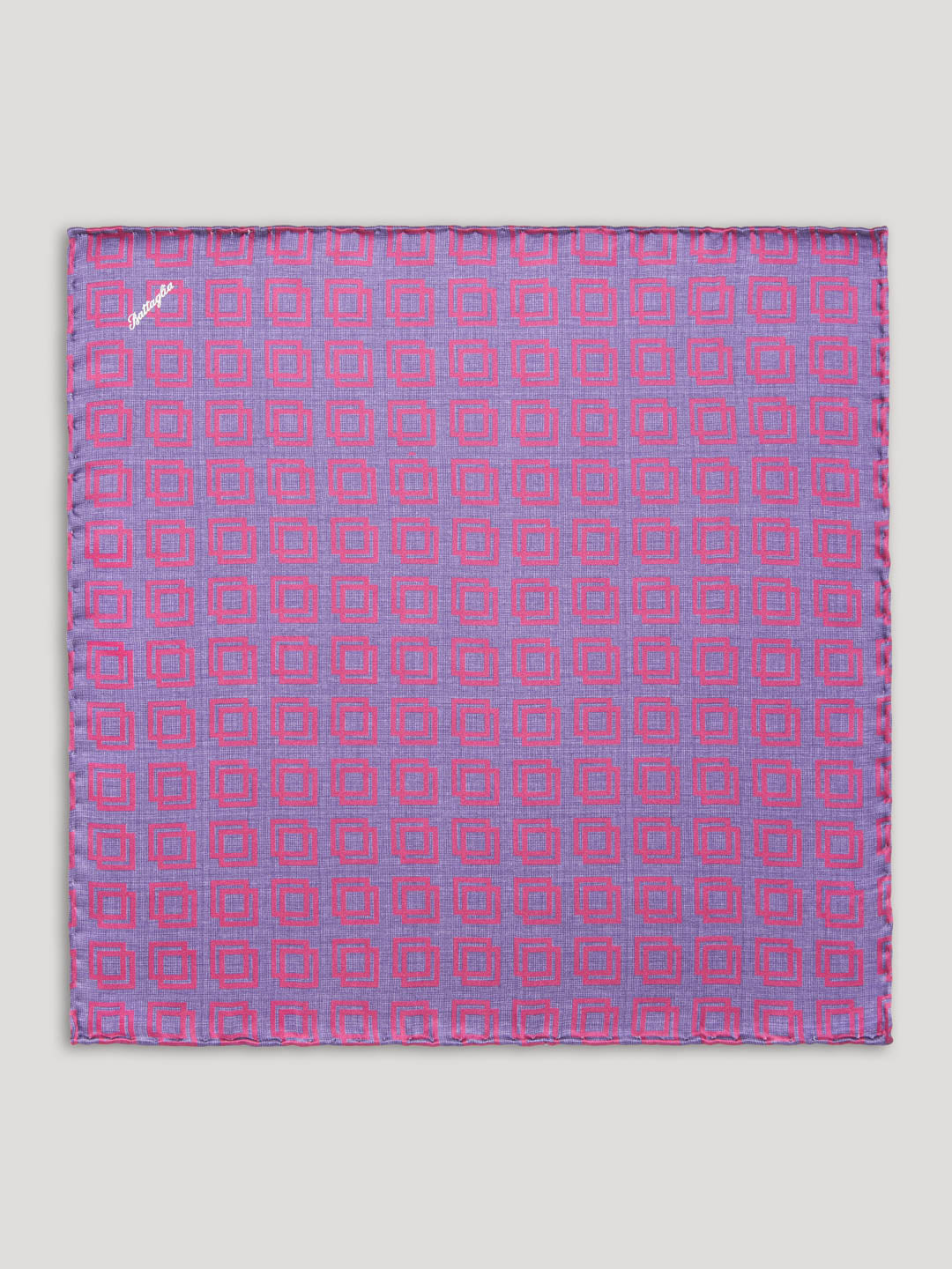 Pink and purple handkerchief with geometric design. 