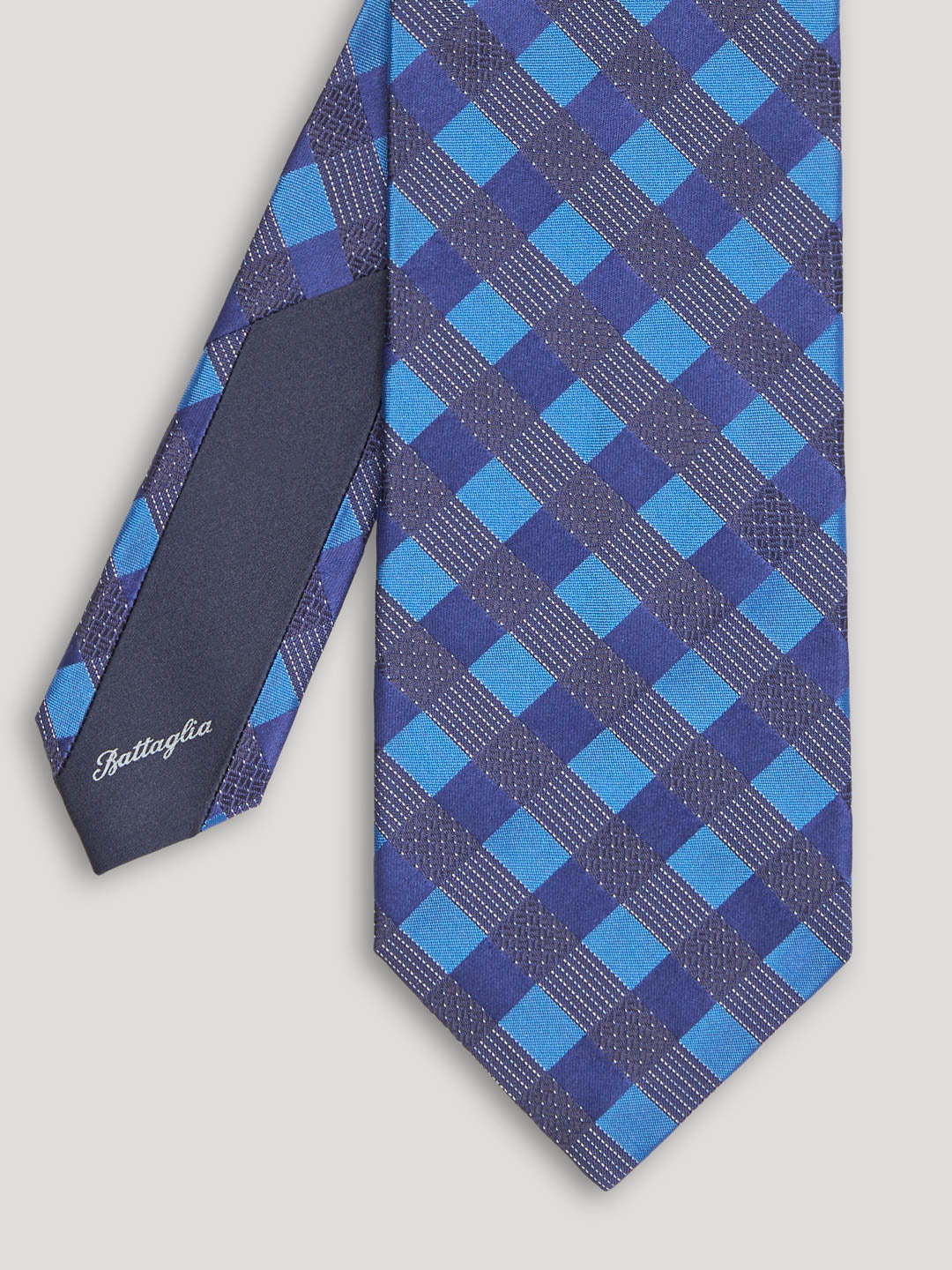 Blue and black geometric design tie.