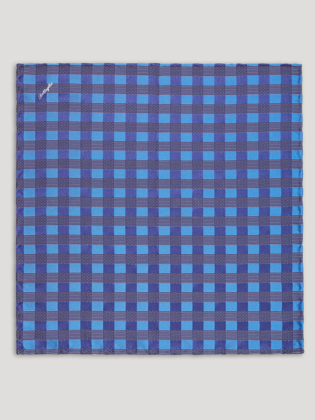 Blue and black handkerchief with geometric design. 