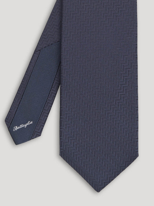 Black tone on tone tie with zig zag design.