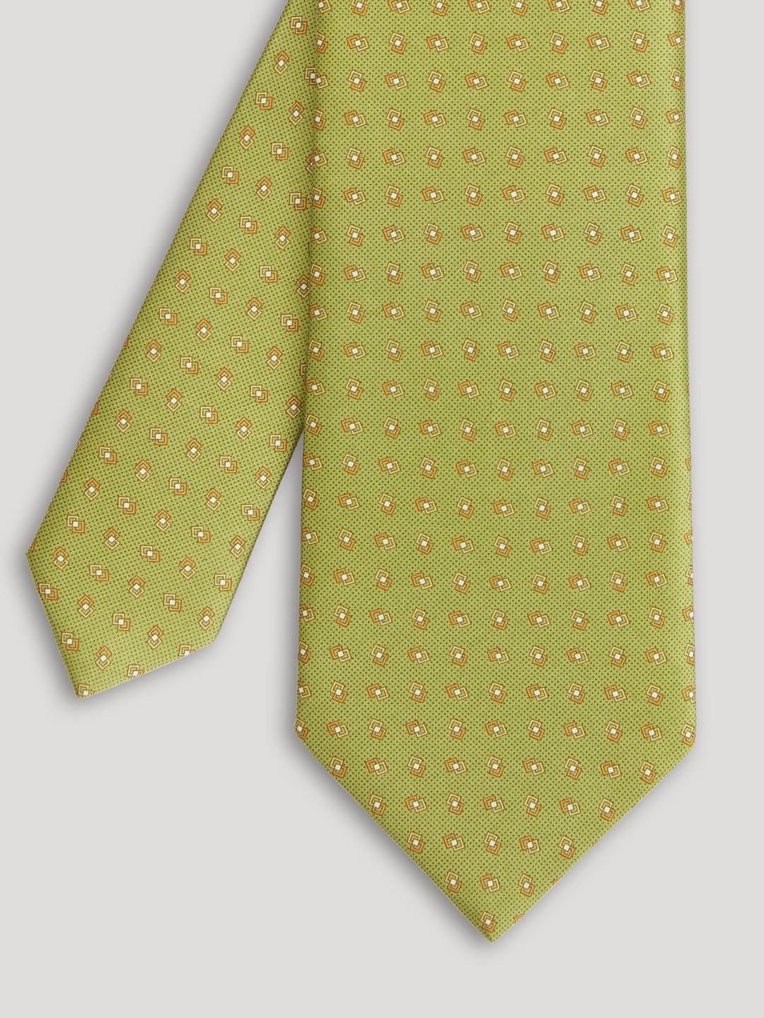 Lime green tie with gold diamond design.