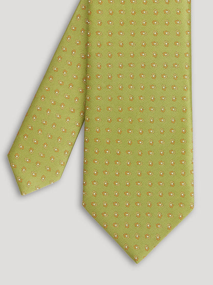 Lime green tie with gold diamond design. 