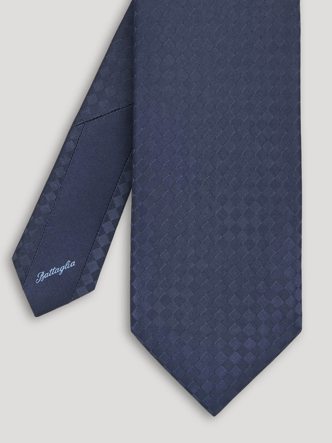 Blue tone on tone checkerboard tie. 
