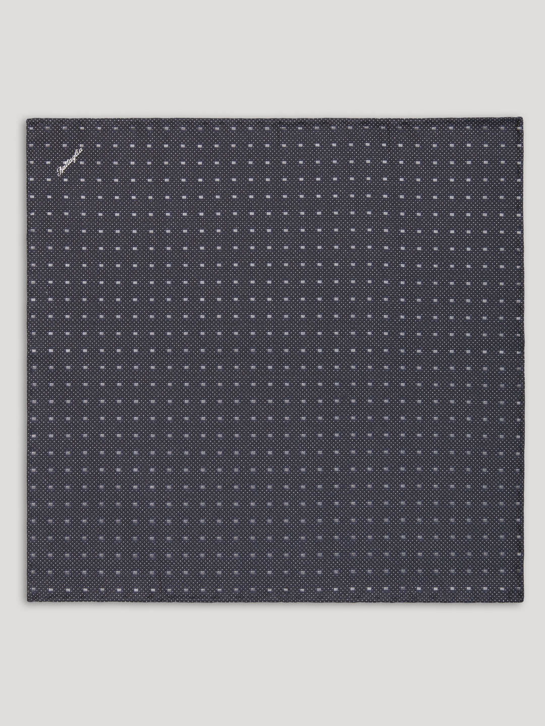 Black handkerchief with silver geometric design. 