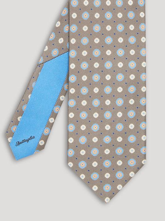 White grey beige and blue tie with large pattern