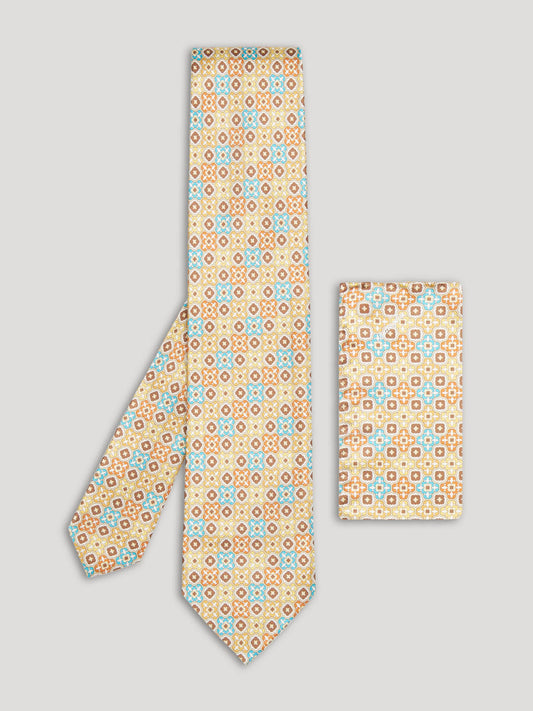 Yellow blue and beige tie with large pattern and matching handkerchief