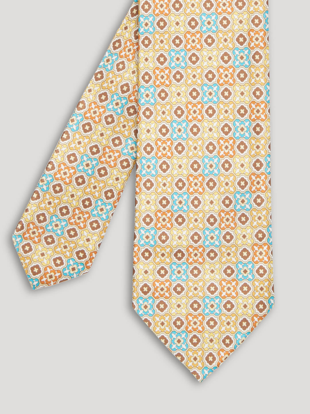 Yellow blue and beige tie with large pattern