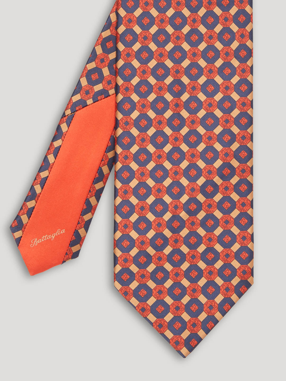 Red, gold and blue tie with large pattern