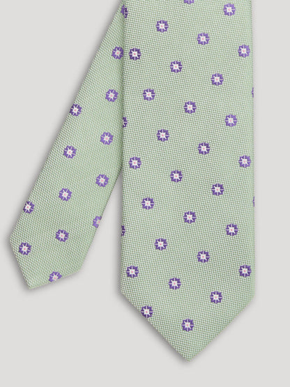Green and purple tie with large pattern