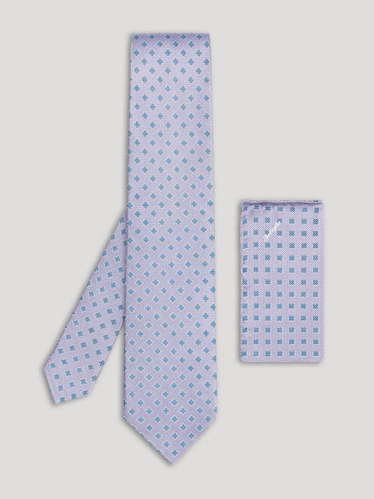 Purple and blue tie with large pattern and matching handkerchief